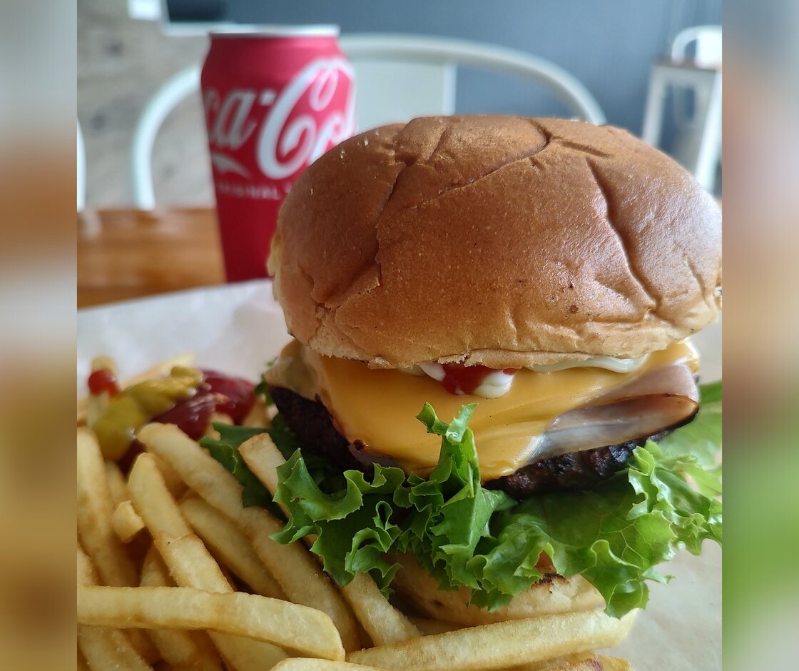 Char-grilled cheeseburger with ham, lettuce and fries